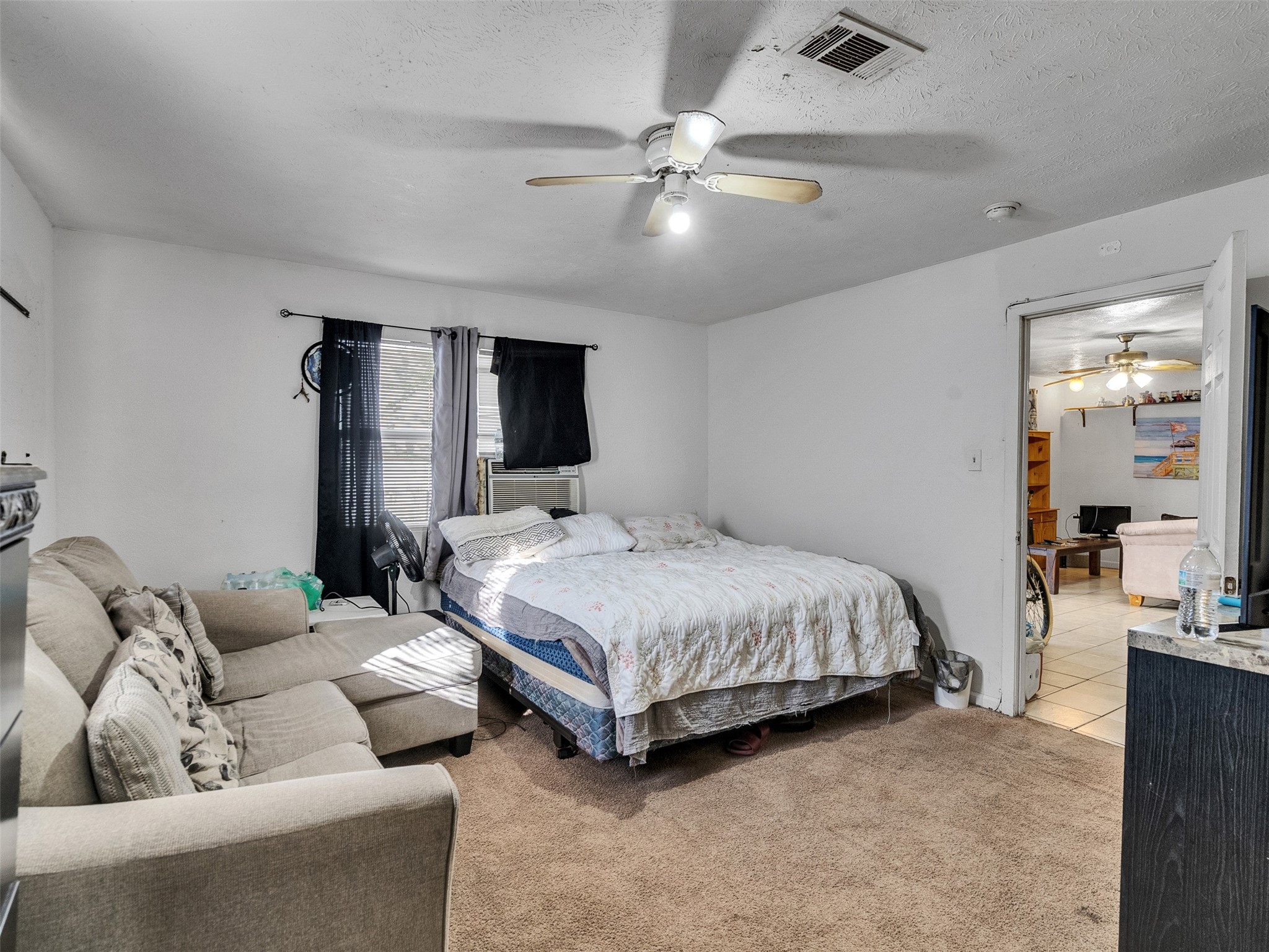 4323 Avenue R 1/2 Galveston, TX 77550 - Photo 27 of 41 Bedroom 1 (Rear Unit):
Another look shows space for both sleeping and storage—ideal for anyone wanting comfort and simplicity.