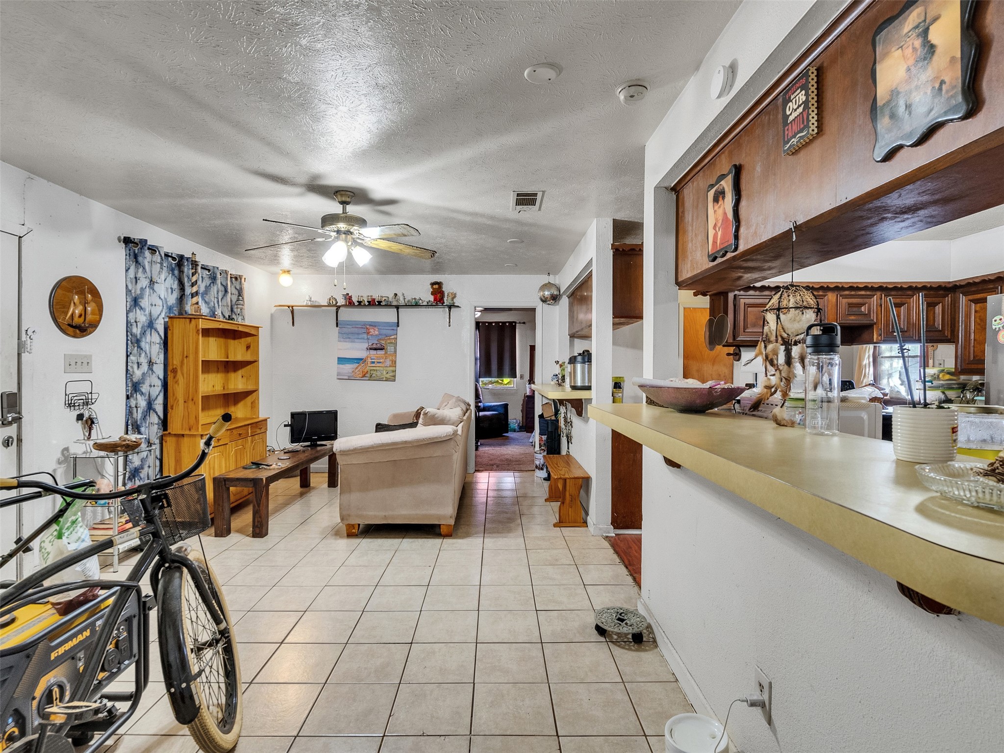 4323 Avenue R 1/2 Galveston, TX 77550 - Photo 29 of 41 Dining Area (Rear Unit):
Adjacent to the kitchen, the dining space is perfectly sized for everyday meals or casual gatherings. Tile floors and bright walls add to its easy-living feel.