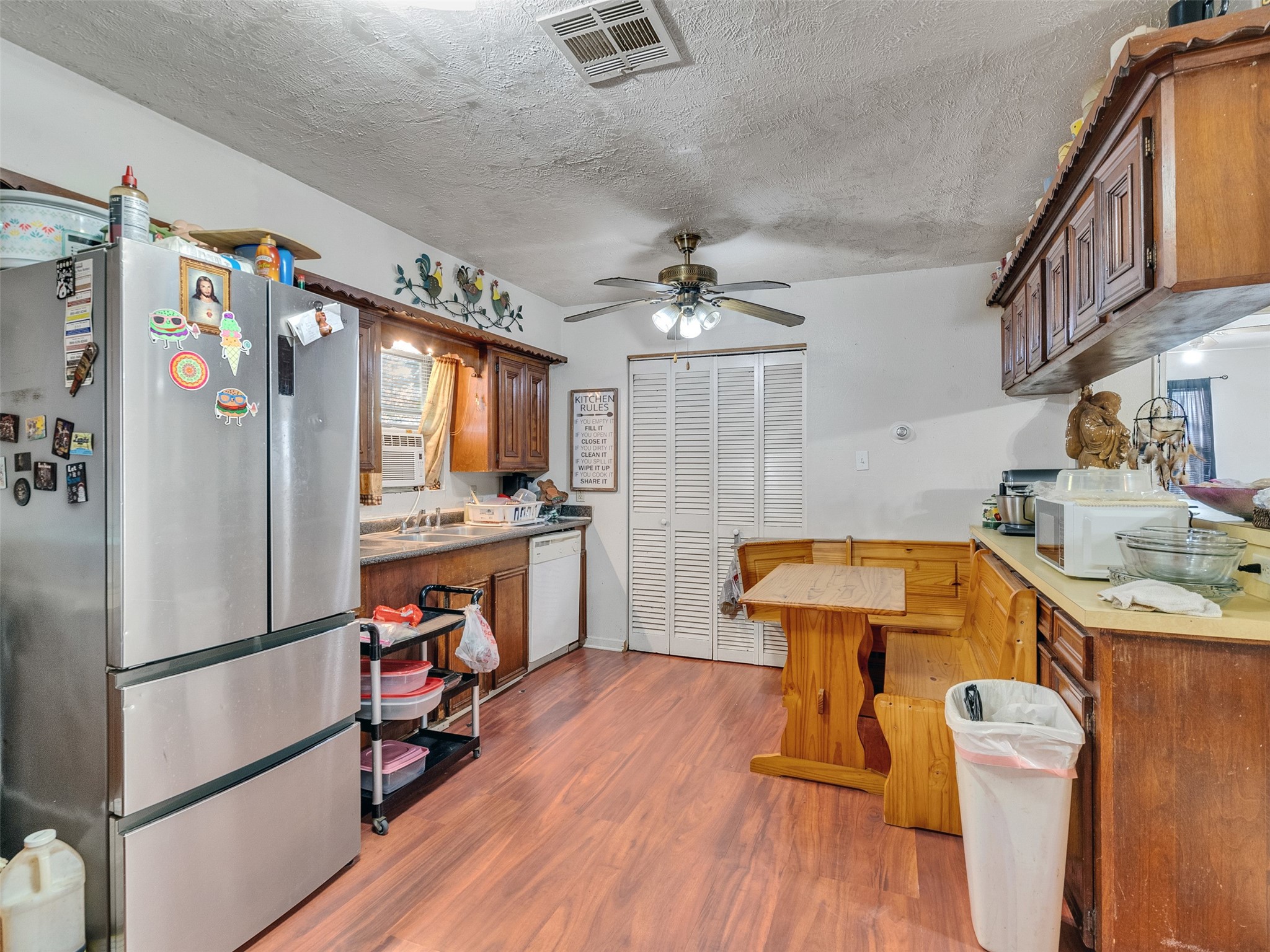 4323 Avenue R 1/2 Galveston, TX 77550 - Photo 32 of 41 Kitchen (Rear Unit):
A different angle shows the efficient setup and bright walls, making the space feel fresh and airy.