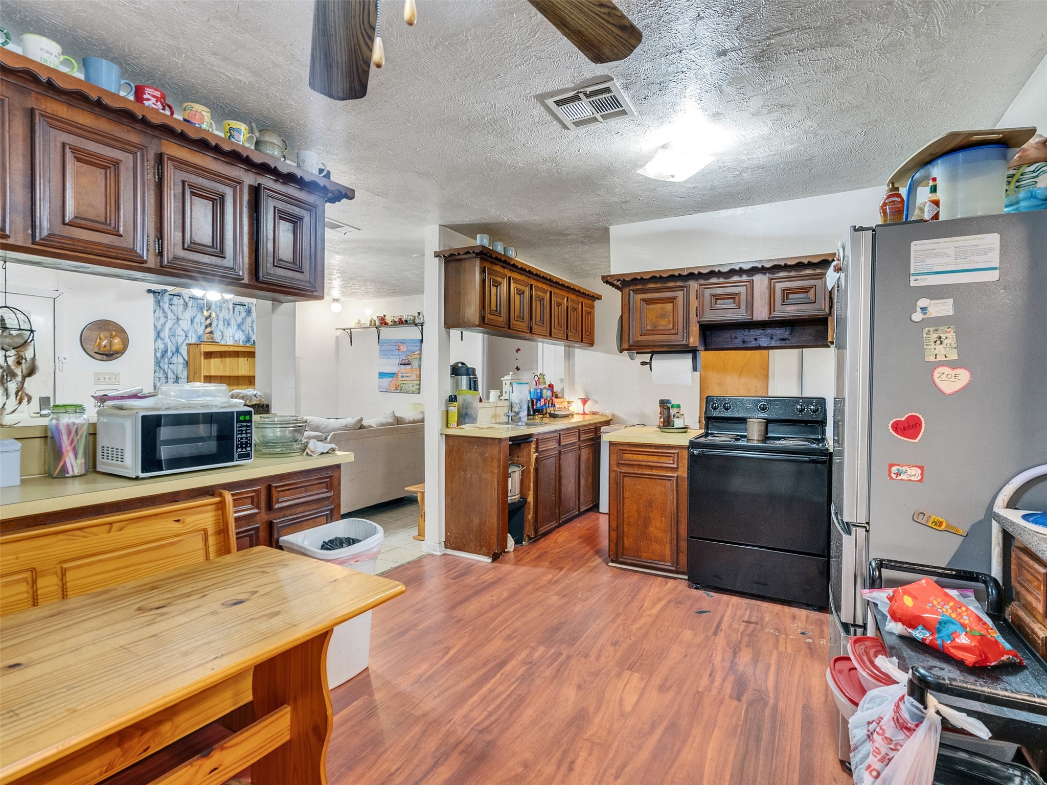 4323 Avenue R 1/2 Galveston, TX 77550 - Photo 33 of 41 Kitchen with Open Passthrough to Living (Rear Unit):
The kitchen features an open passthrough to the living area, keeping the space connected and airy. It’s ideal for serving meals or chatting while cooking.