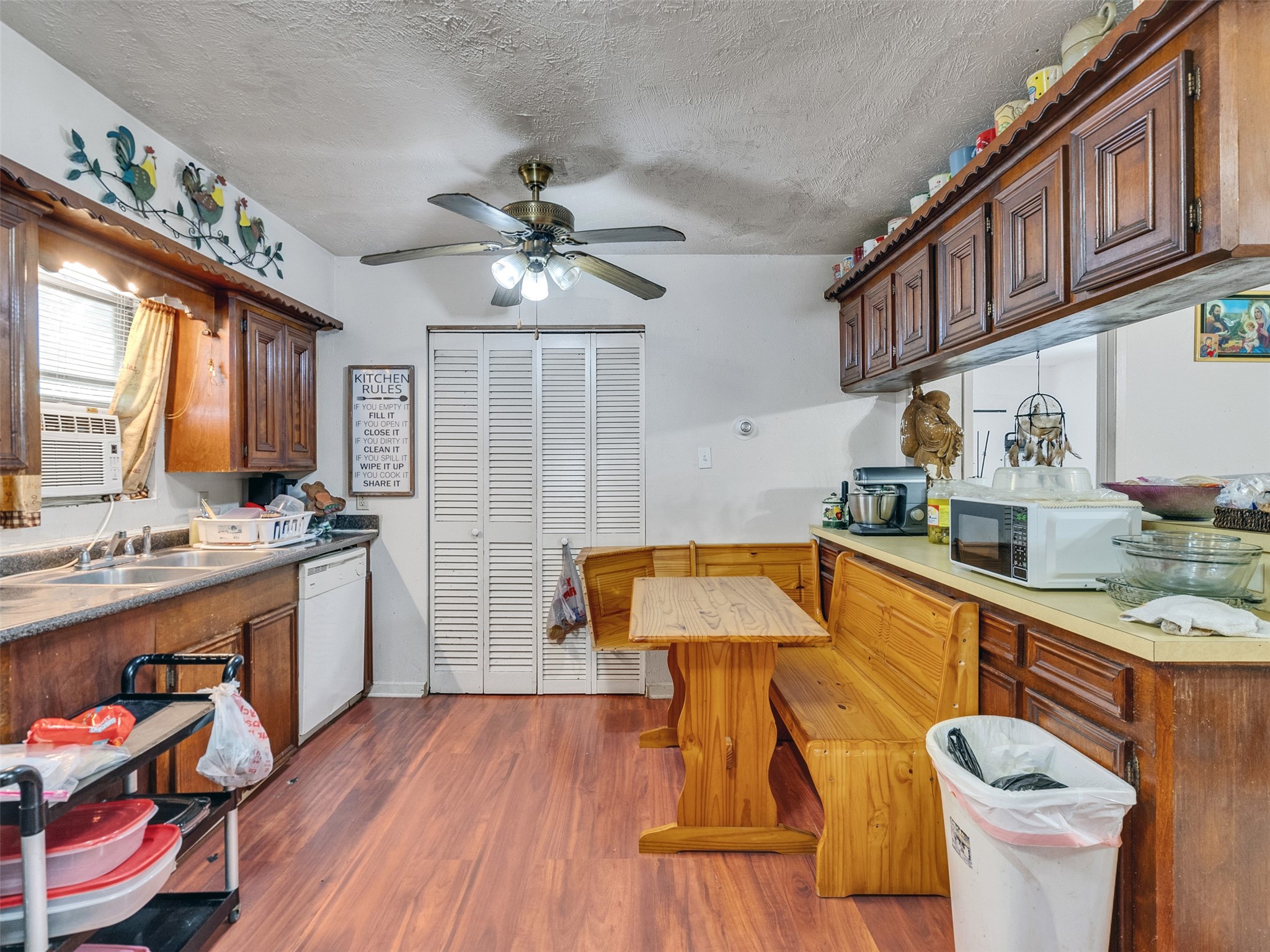 4323 Avenue R 1/2 Galveston, TX 77550 - Photo 34 of 41 Kitchen with Counter/Breakfast Bar (Rear Unit):
This view shows the counter separating the kitchen from the living area—perfect for casual meals or extra prep space. The layout adds both charm and convenience.