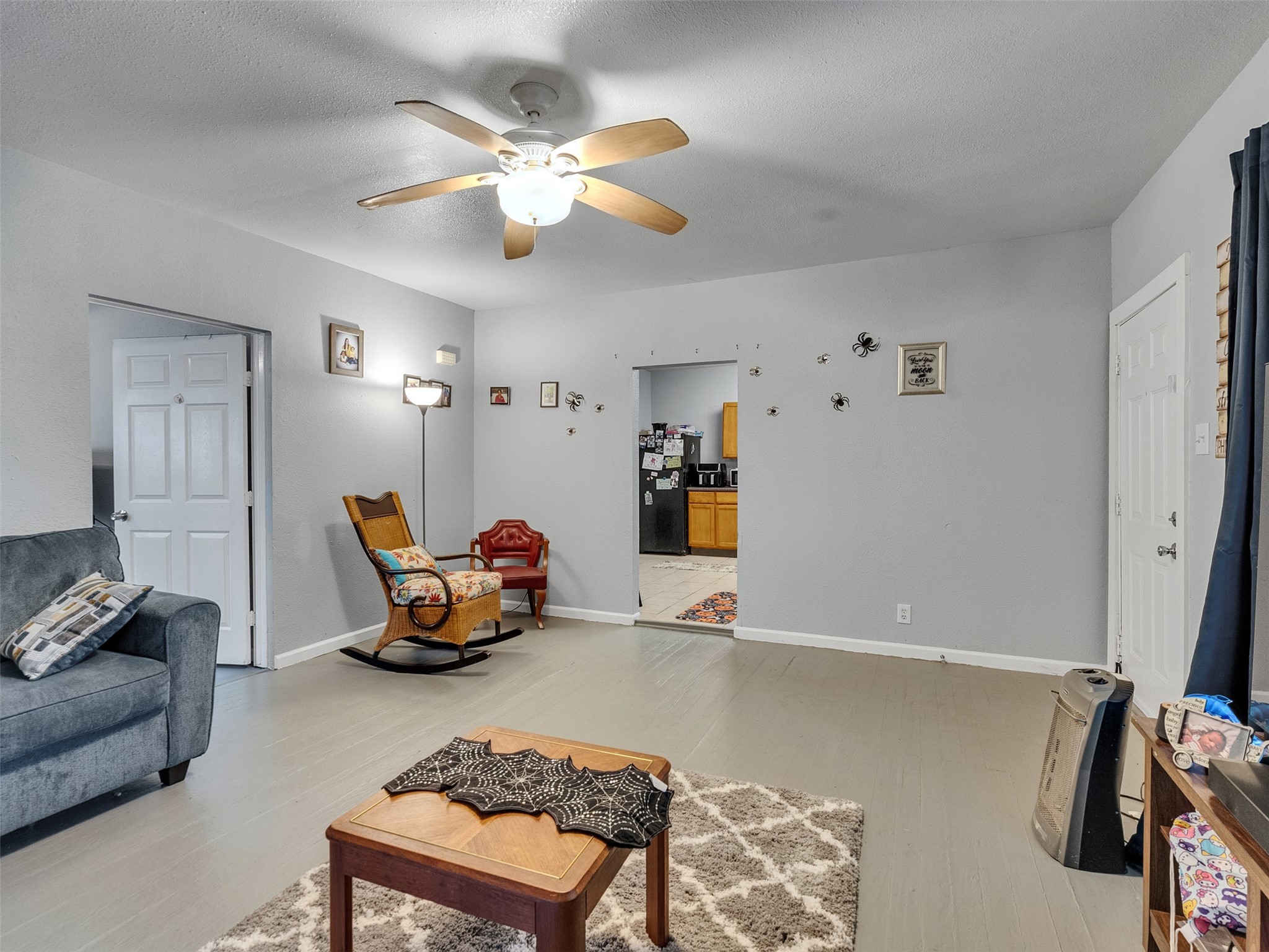 4323 Avenue R 1/2 Galveston, TX 77550 - Photo 4 of 41 Living Room (Front Unit):
Another angle of the living room highlights its natural flow and cozy layout. Large windows bring in great light, making it a cheerful space for everyday living.