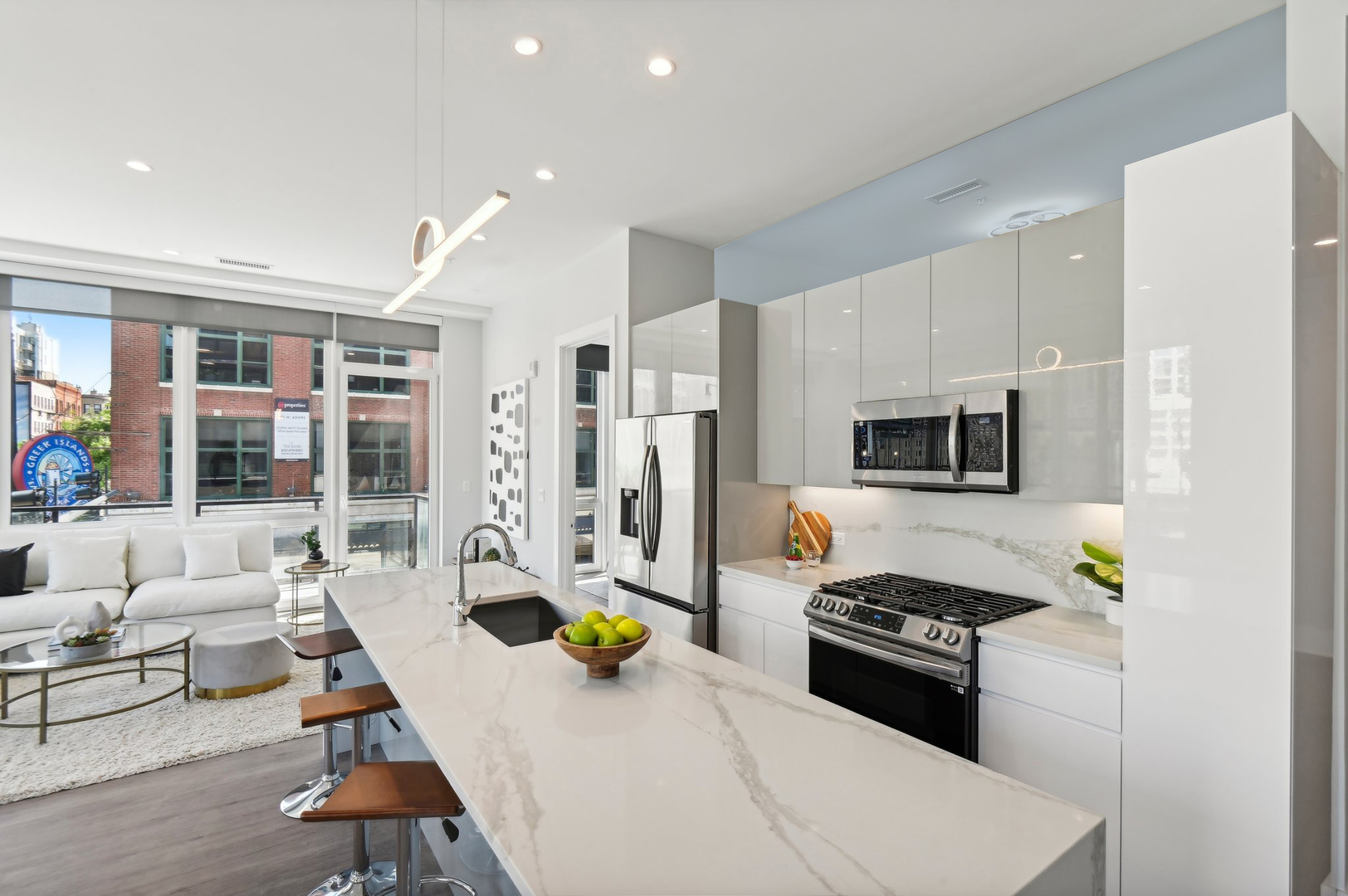 812 West Adams Street, Unit 600 Chicago, IL 60607 - Photo 12 of 46 a kitchen with sink a stove and refrigerator