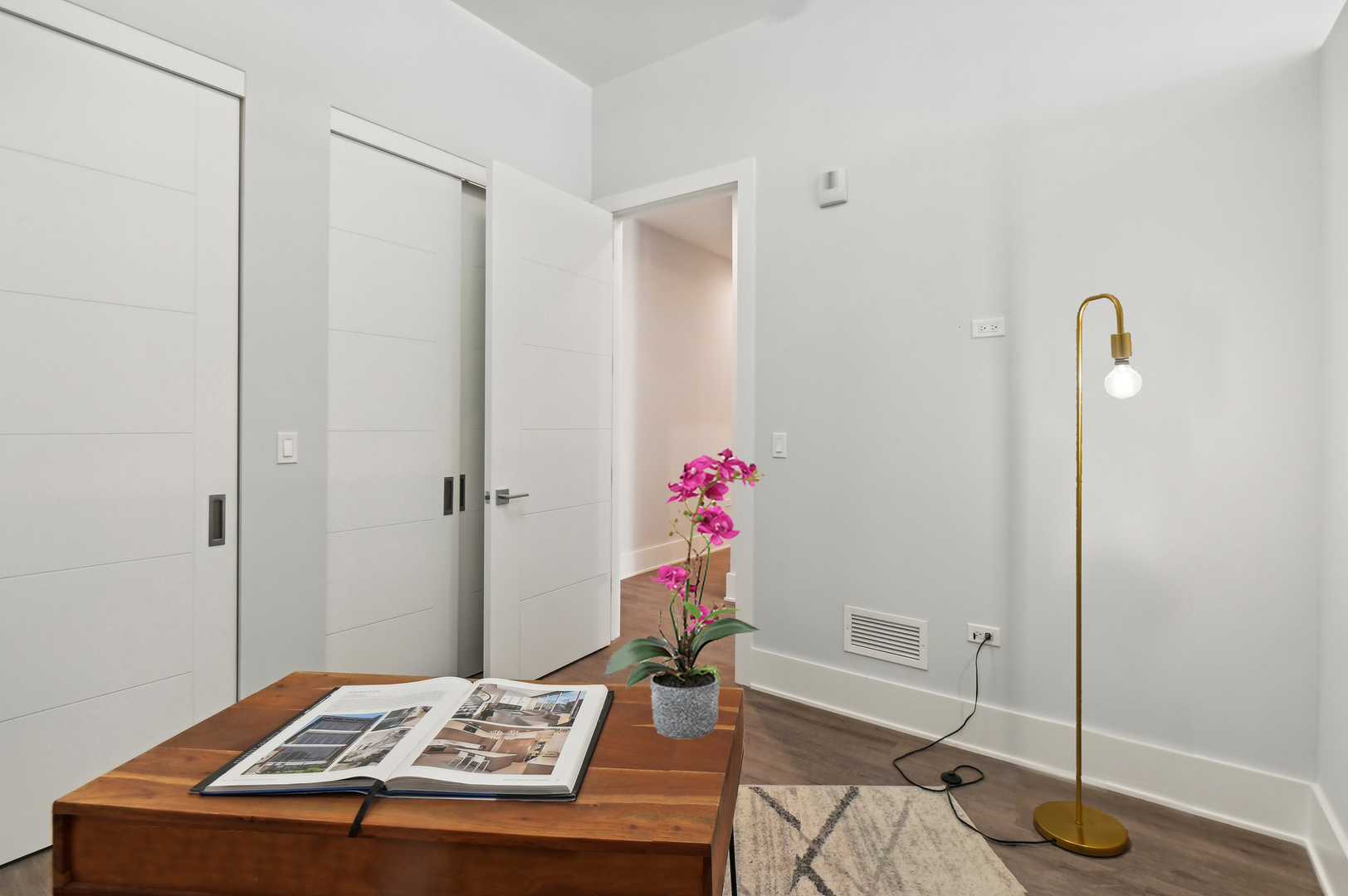 812 West Adams Street, Unit 600 Chicago, IL 60607 - Photo 22 of 46 a room with a table and a chandelier