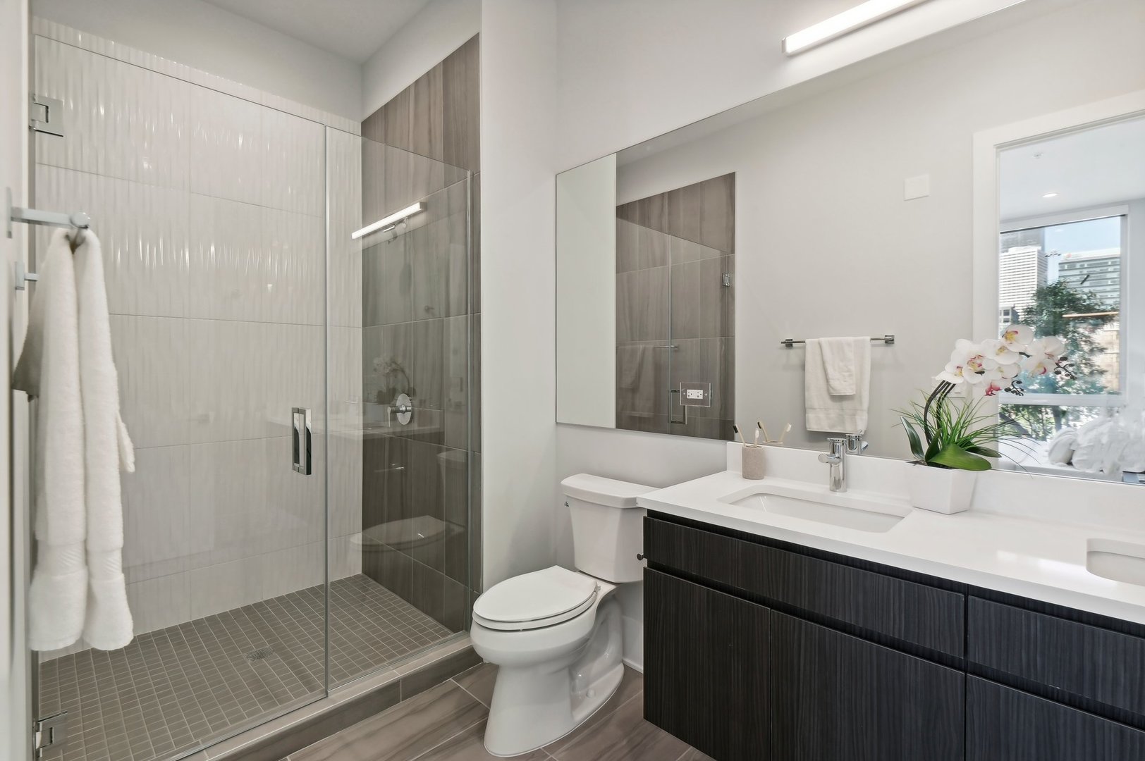 812 West Adams Street, Unit 600 Chicago, IL 60607 - Photo 29 of 46 a bathroom with a sink a toilet and shower