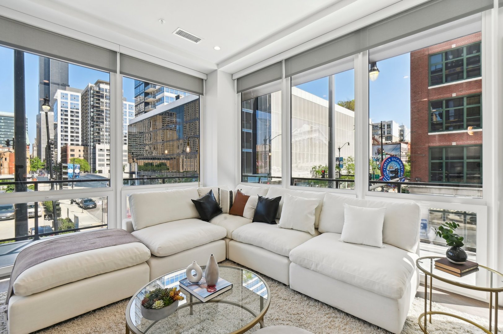 812 West Adams Street, Unit 600 Chicago, IL 60607 - Photo 5 of 46 a living room with furniture and a large window
