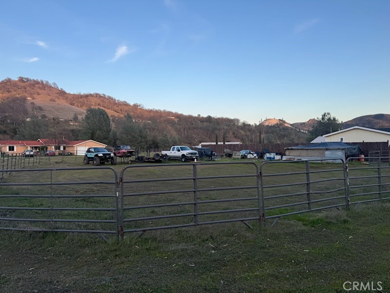 3096 Spring Valley Road Clearlake Oaks, CA 95423 - Photo 6 of 7 a view of a lot of trees and houses
