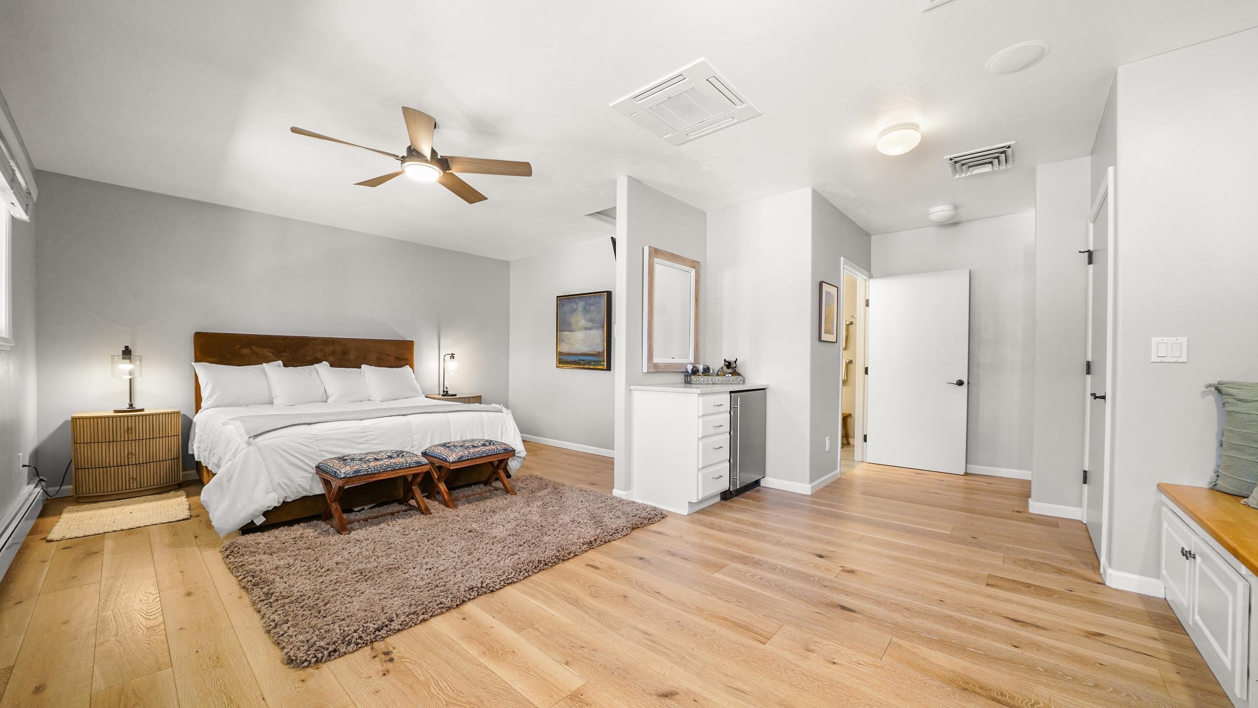 3339 C Road Palisade, CO 81526 - Photo 22 of 39 a bedroom with a bed and cabinets