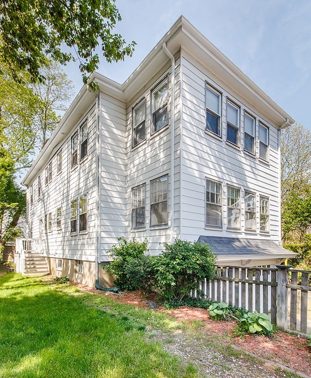 21 Watson Road, Unit 21 Belmont, MA 02478 - Photo 17 of 20 a front view of a house with a yard