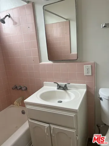a bathroom with a sink and a bathtub