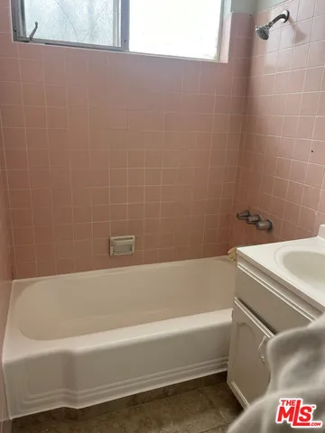 a bathroom with a bathtub