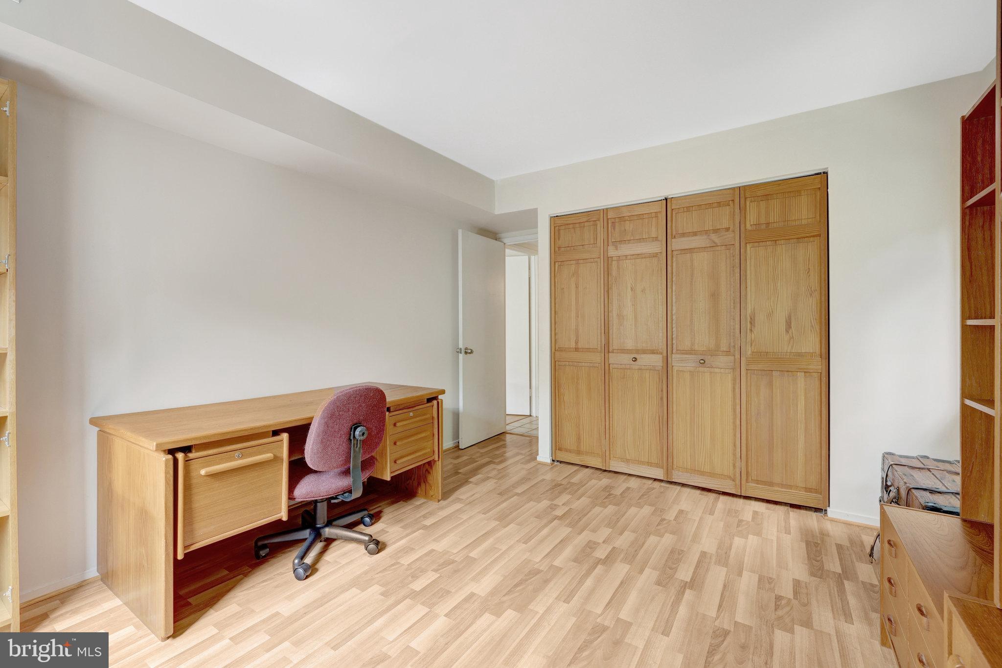1665 Parkcrest Circle, Unit 301 Reston, VA 20190 - Photo 24 of 36 a view of workspace with wooden floor chair and windows
