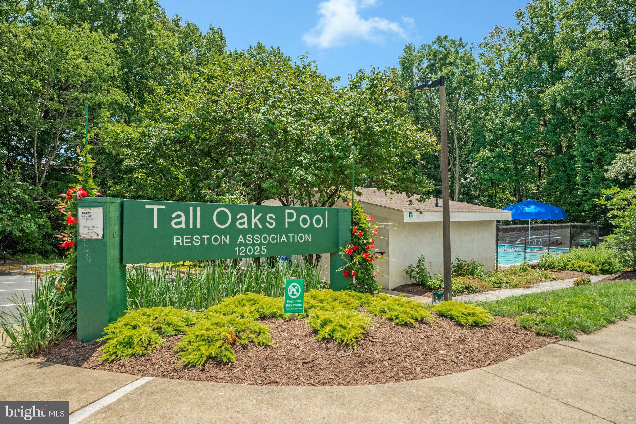 1665 Parkcrest Circle, Unit 301 Reston, VA 20190 - Photo 31 of 36 a sign on the side of the road