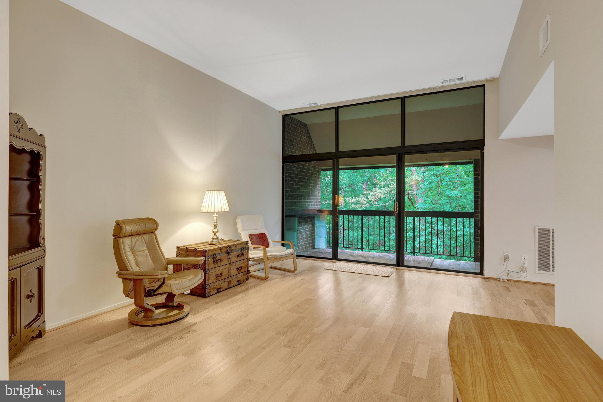1665 Parkcrest Circle, Unit 301 Reston, VA 20190 - Photo 6 of 36 a view of a room with workspace and a window