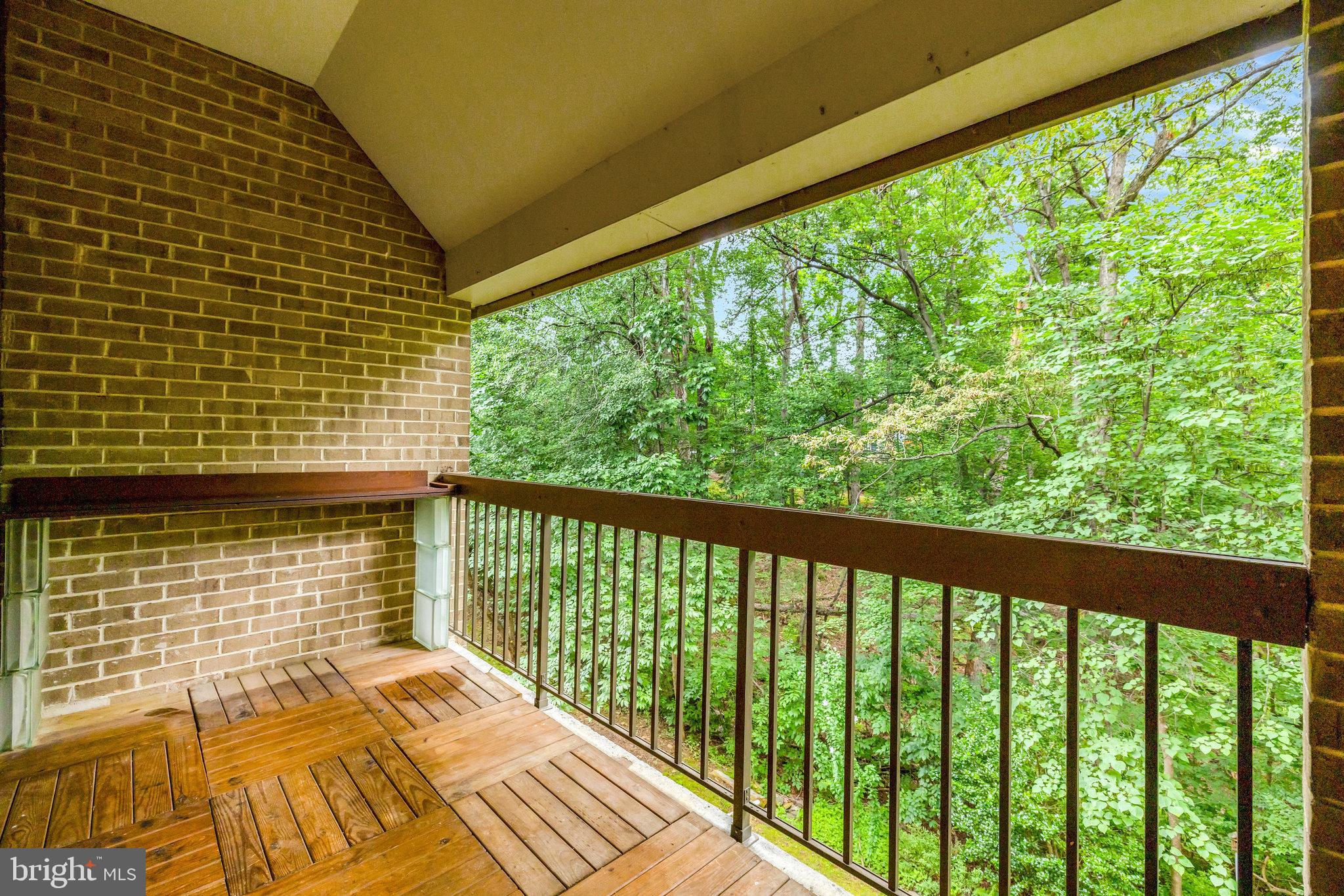 1665 Parkcrest Circle, Unit 301 Reston, VA 20190 - Photo 7 of 36 a view of balcony with wooden floor