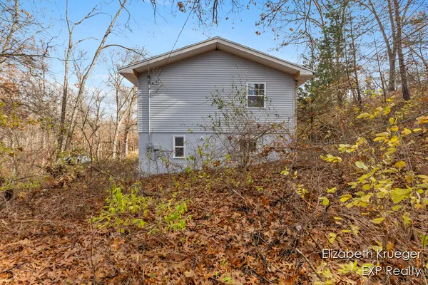 $450,000 | 8945 Vergennes Street Southeast, Ada, MI 49301