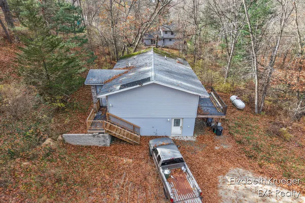 $450,000 | 8945 Vergennes Street Southeast, Ada, MI 49301