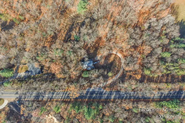 $450,000 | 8945 Vergennes Street Southeast, Ada, MI 49301