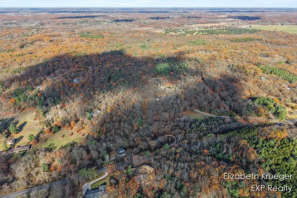 $450,000 | 8945 Vergennes Street Southeast, Ada, MI 49301