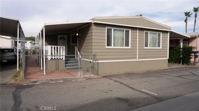 a view of house with garage