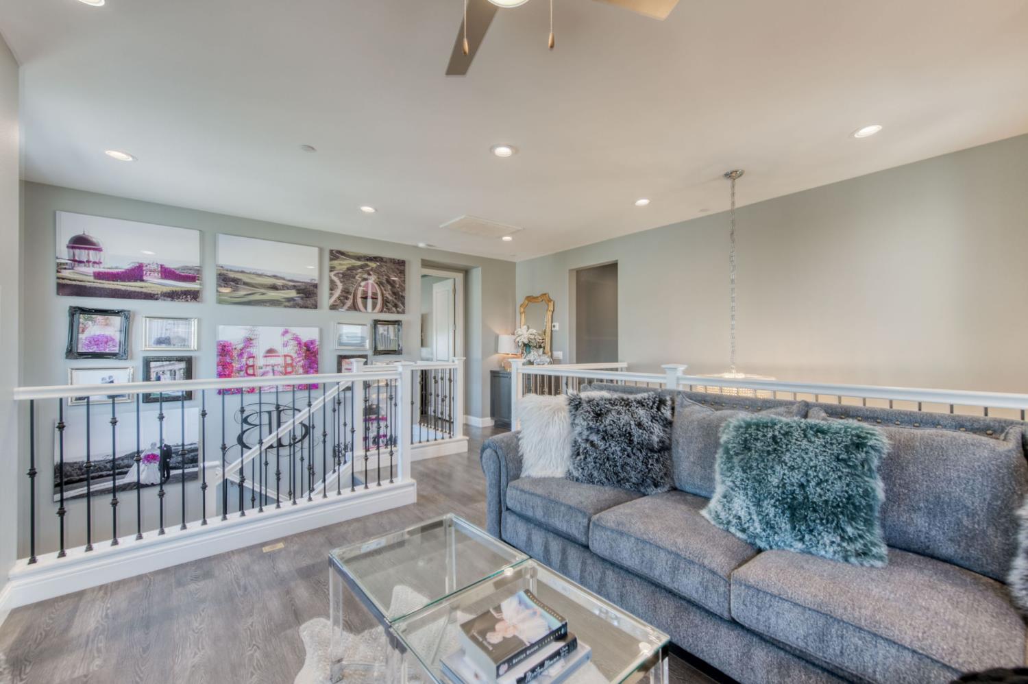 273 Meridian Avenue Madera, CA 93636 - Photo 15 of 55 a living room with furniture and a rug