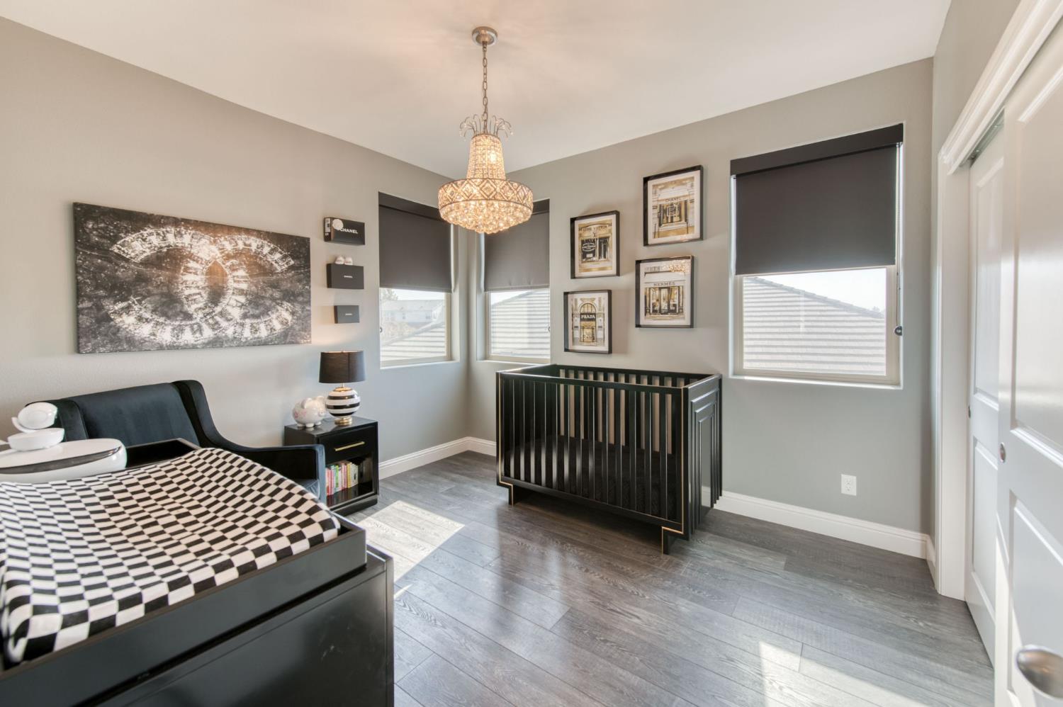 273 Meridian Avenue Madera, CA 93636 - Photo 20 of 55 a bedroom with furniture and a window