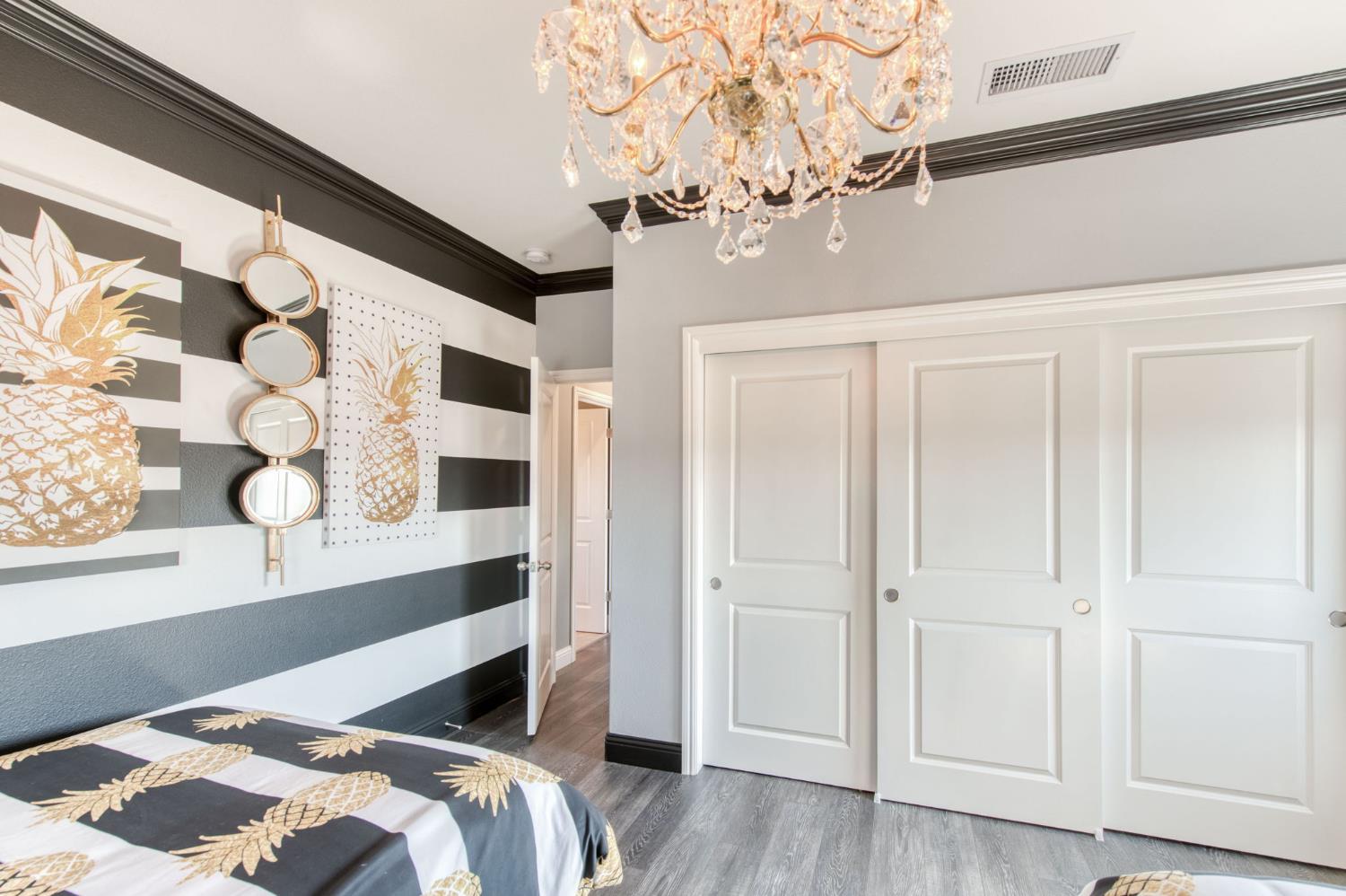 273 Meridian Avenue Madera, CA 93636 - Photo 24 of 55 a bedroom with a bed and a window