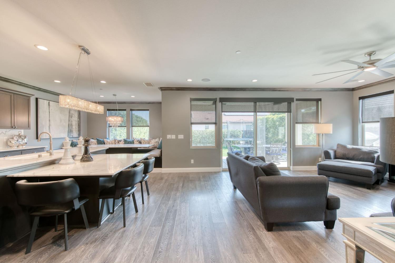 273 Meridian Avenue Madera, CA 93636 - Photo 27 of 55 a view of a dining room with furniture window and wooden floor