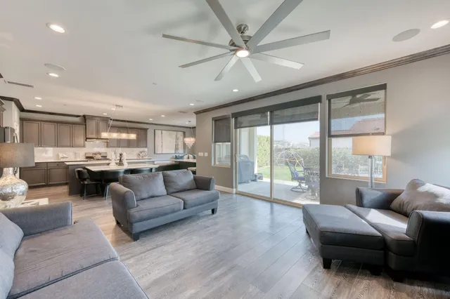 a kitchen with a sink appliances and cabinets