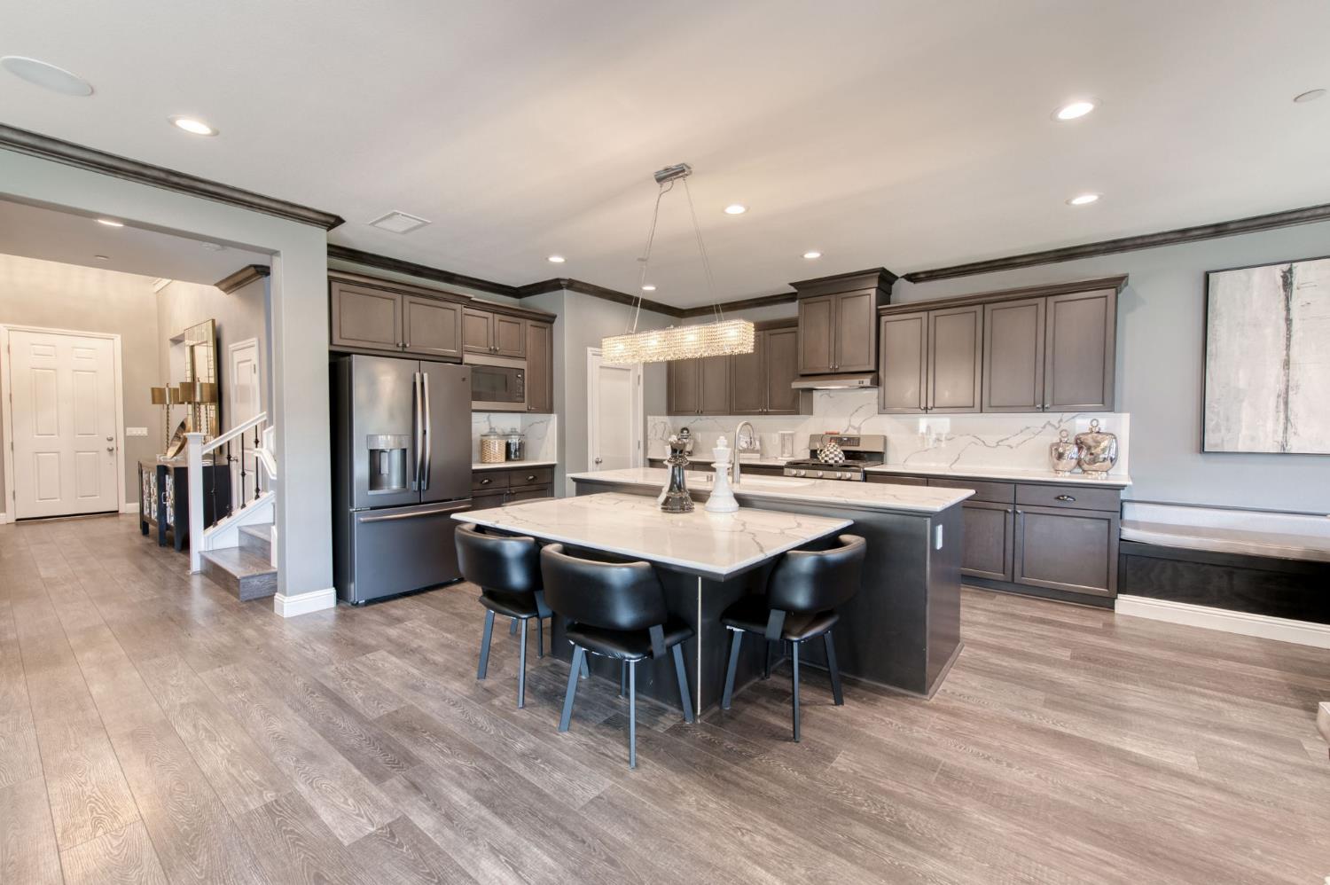 273 Meridian Avenue Madera, CA 93636 - Photo 31 of 55 a kitchen with a sink appliances and cabinets