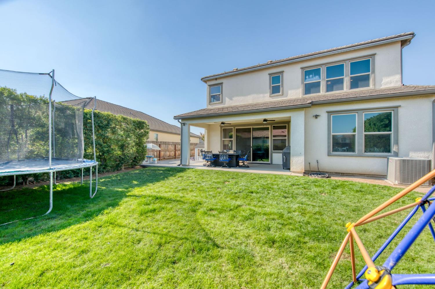 273 Meridian Avenue Madera, CA 93636 - Photo 44 of 55 a view of a house with backyard porch and sitting area