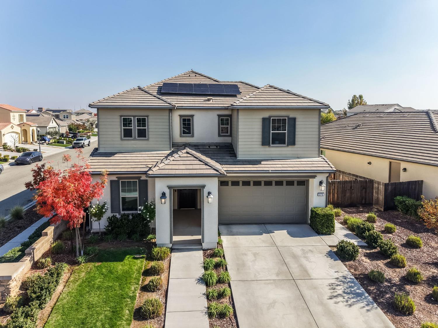 273 Meridian Avenue Madera, CA 93636 - Photo 48 of 55 a front view of a house with a garden