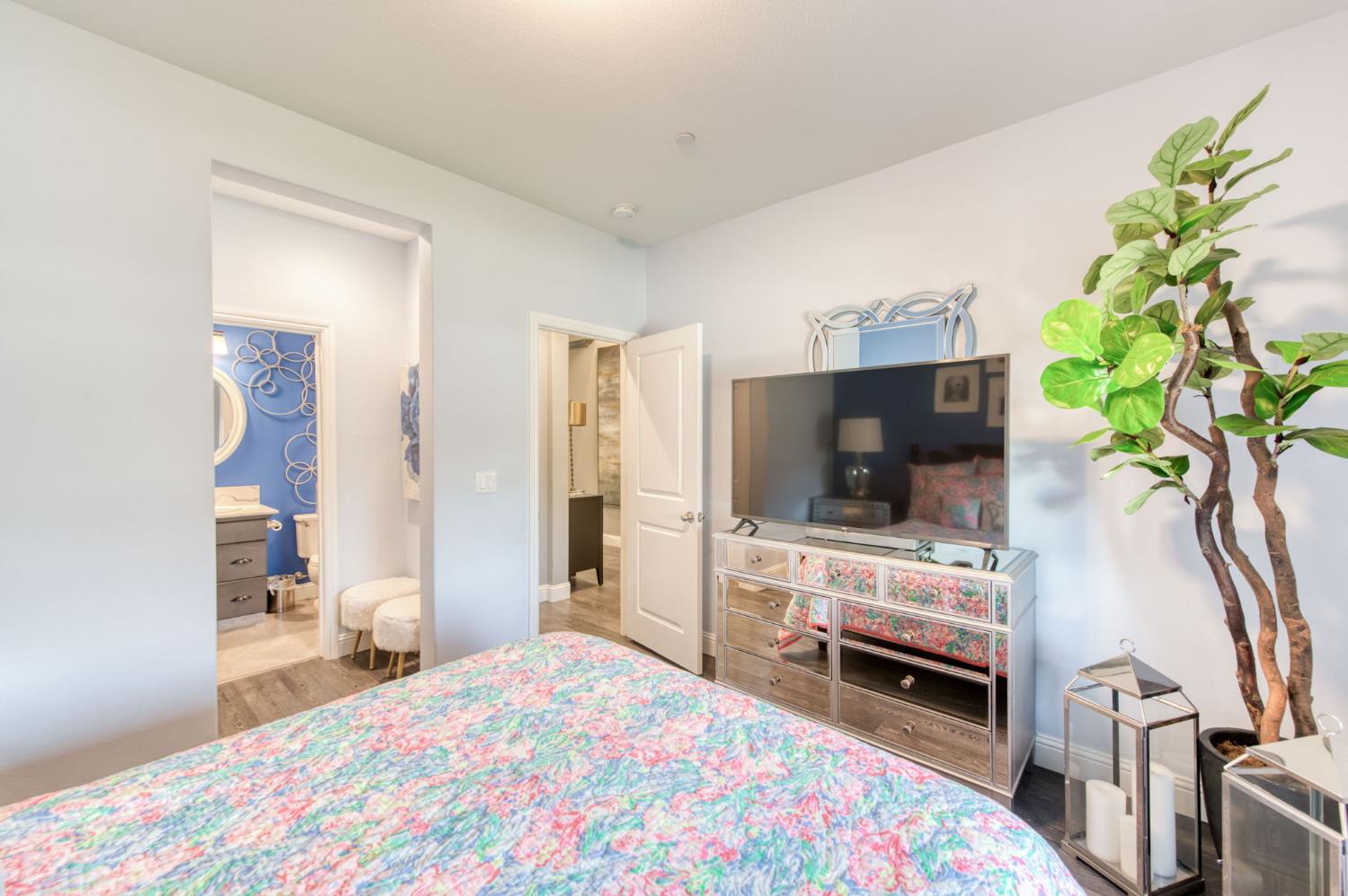 273 Meridian Avenue Madera, CA 93636 - Photo 8 of 55 a bedroom with a bed and flat screen tv