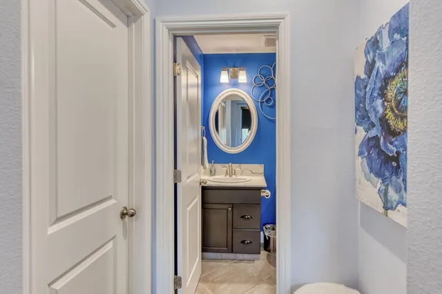 a bathroom with a toilet and a sink