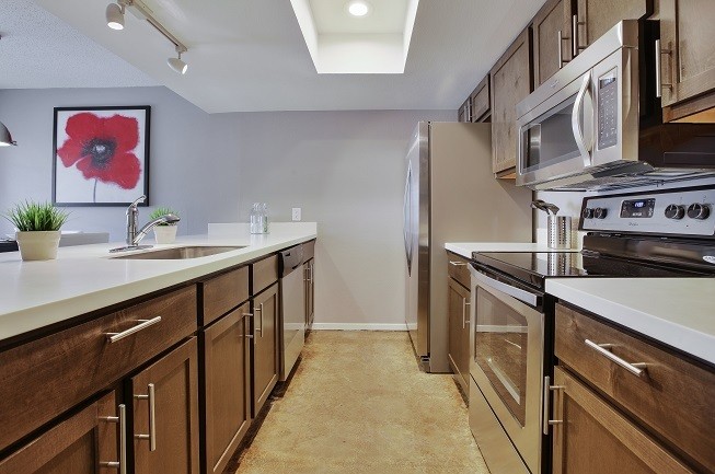a bathroom with a sink a vanity and a mirror