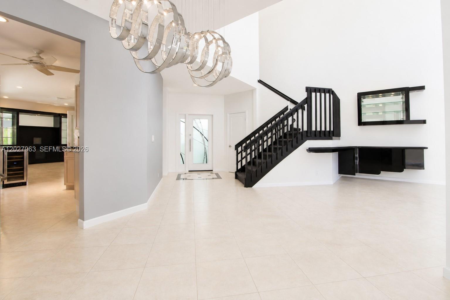 6646 Northwest 25th Terrace Boca Raton, FL 33496 - Photo 4 of 48 a view of entryway and hall