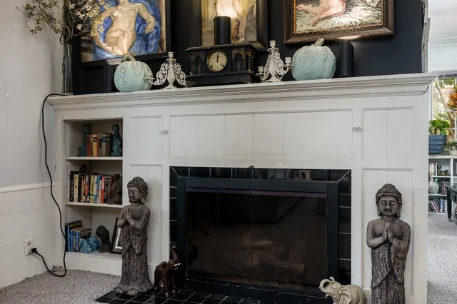 a close view of shoes and a fireplace