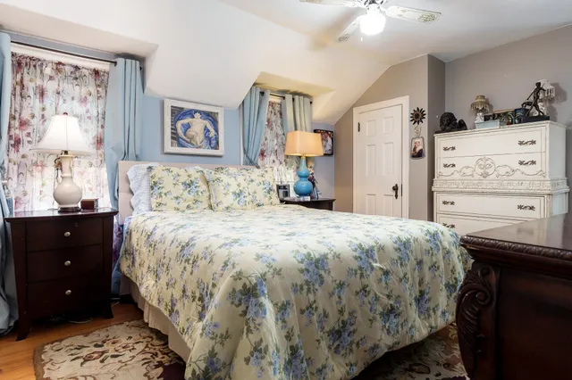 a bedroom with a bed and a cabinets