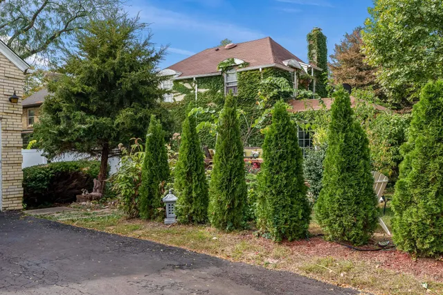 a view of a house with a garage