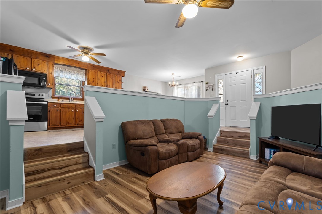 37 La Mae Court Aylett, VA 23009 - Photo 10 of 36 a living room with furniture and a flat screen tv