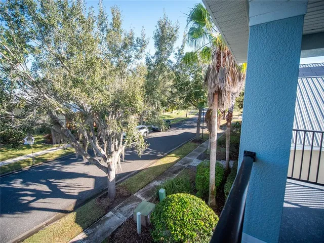 a bathroom with a double vanity sink mirror and toilet