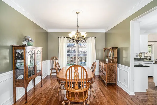 a view of a porch with wooden floor and stairs