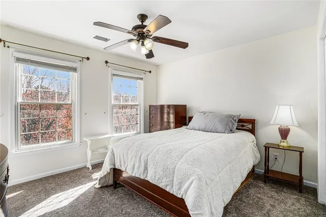 a room with a bed and a table