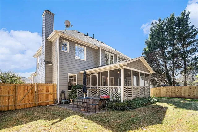 a balcony with furniture and wooden floor