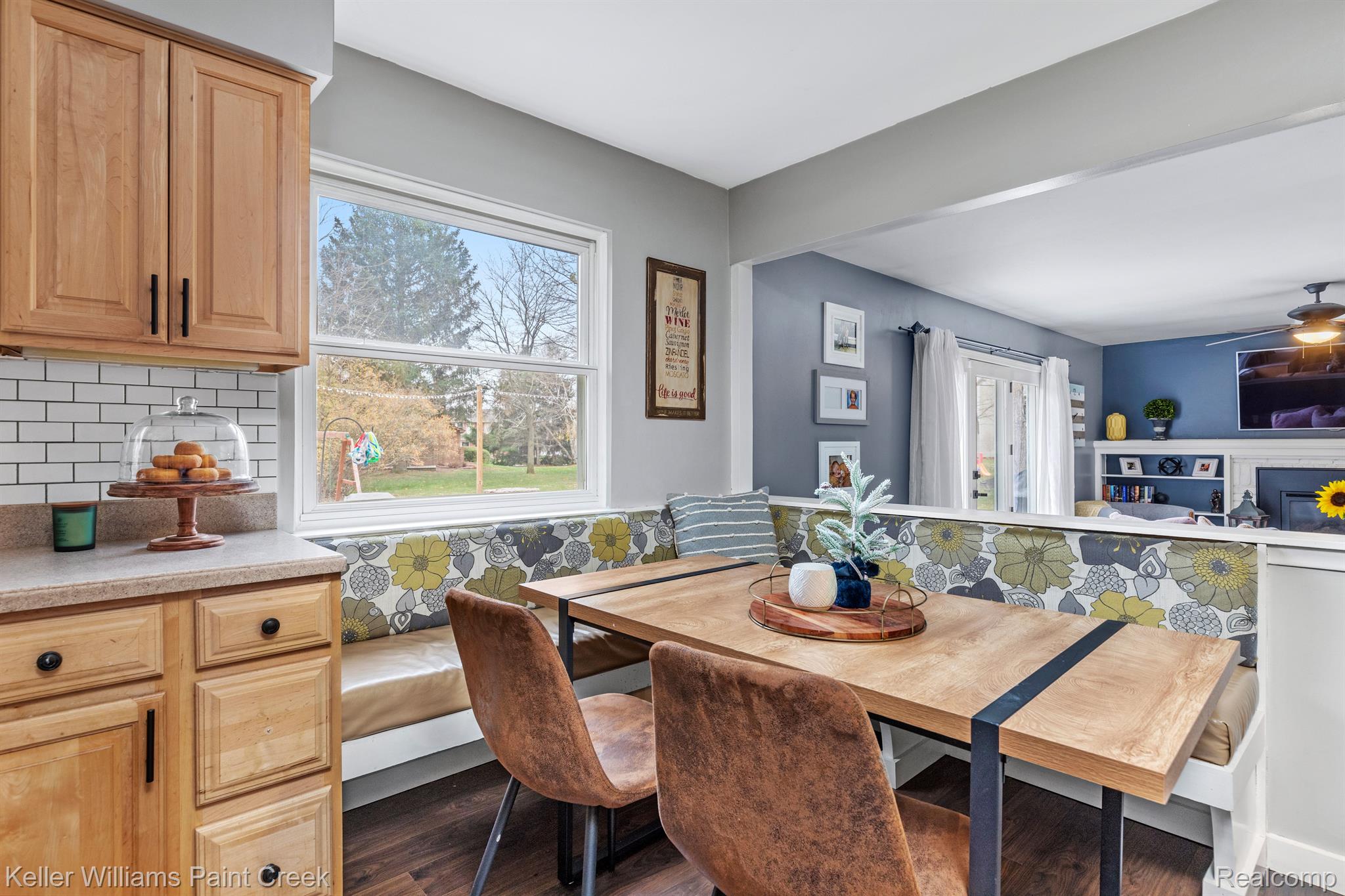 2329 Eaton Gate Road Lake Orion, MI 48360 - Photo 9 of 38 Built-in dining booth overlooks the family room.