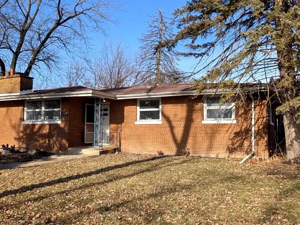 a view of a house with a patio