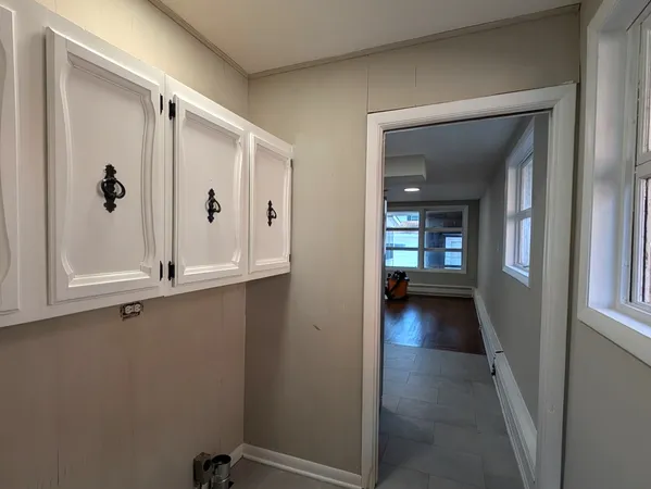 a view of a hallway and closet area