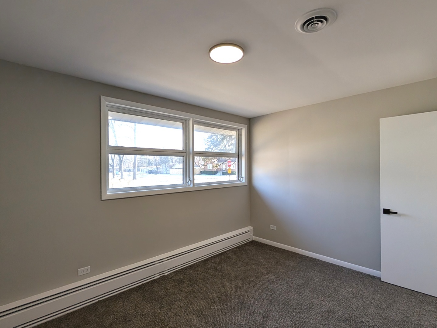 14844 Dearborn Street Dolton, IL 60419 - Photo 9 of 15 an empty room with a window