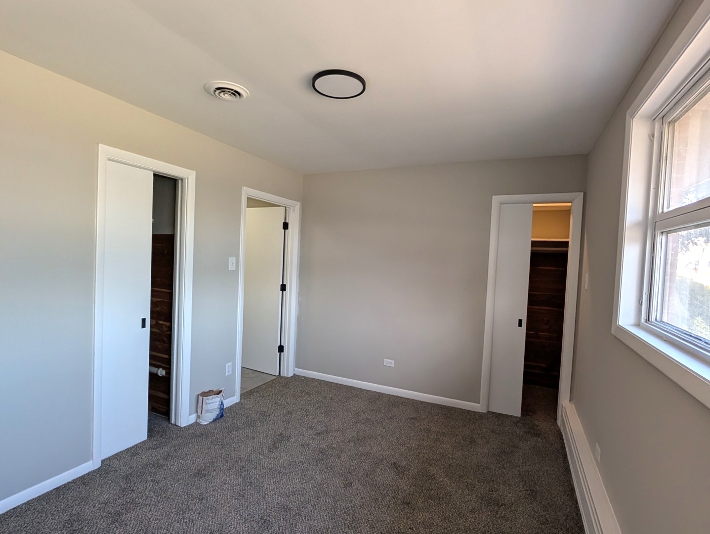 14844 Dearborn Street Dolton, IL 60419 - Photo 10 of 15 an empty room with windows