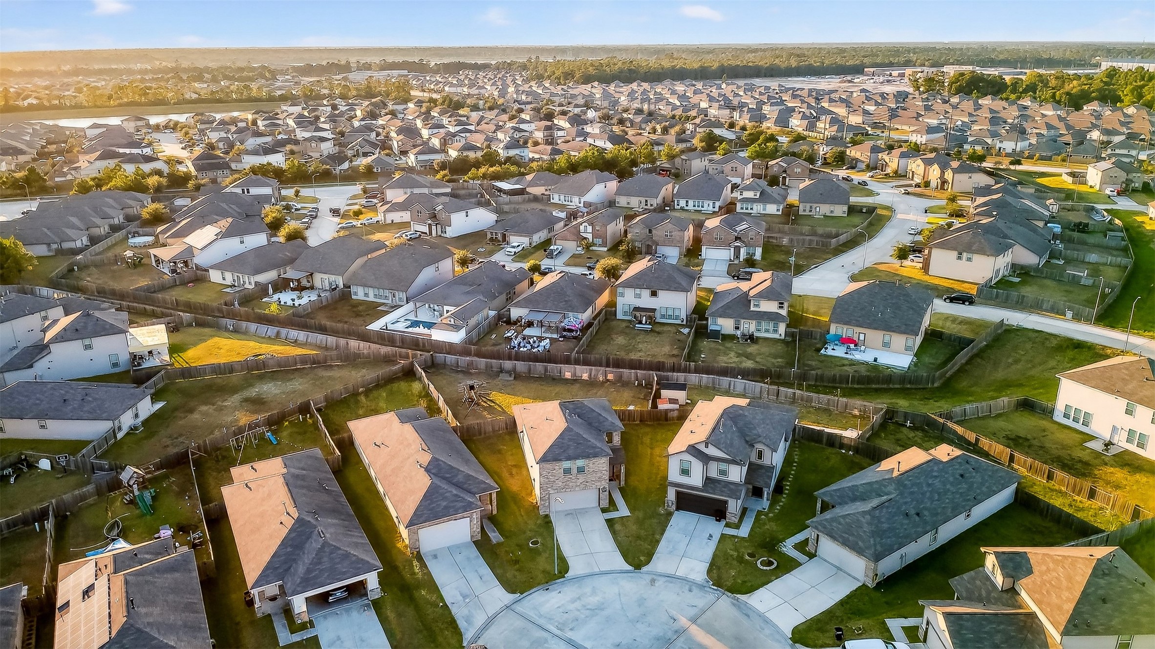 10023 Yanet Grove Lane Houston, TX 77044 - Photo 39 of 40 an aerial view of residential houses with outdoor space and swimming pool